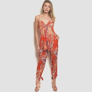 Tropical Chic Floral Jumpsuit Cutout Resort vacation outfit palm leaves orange